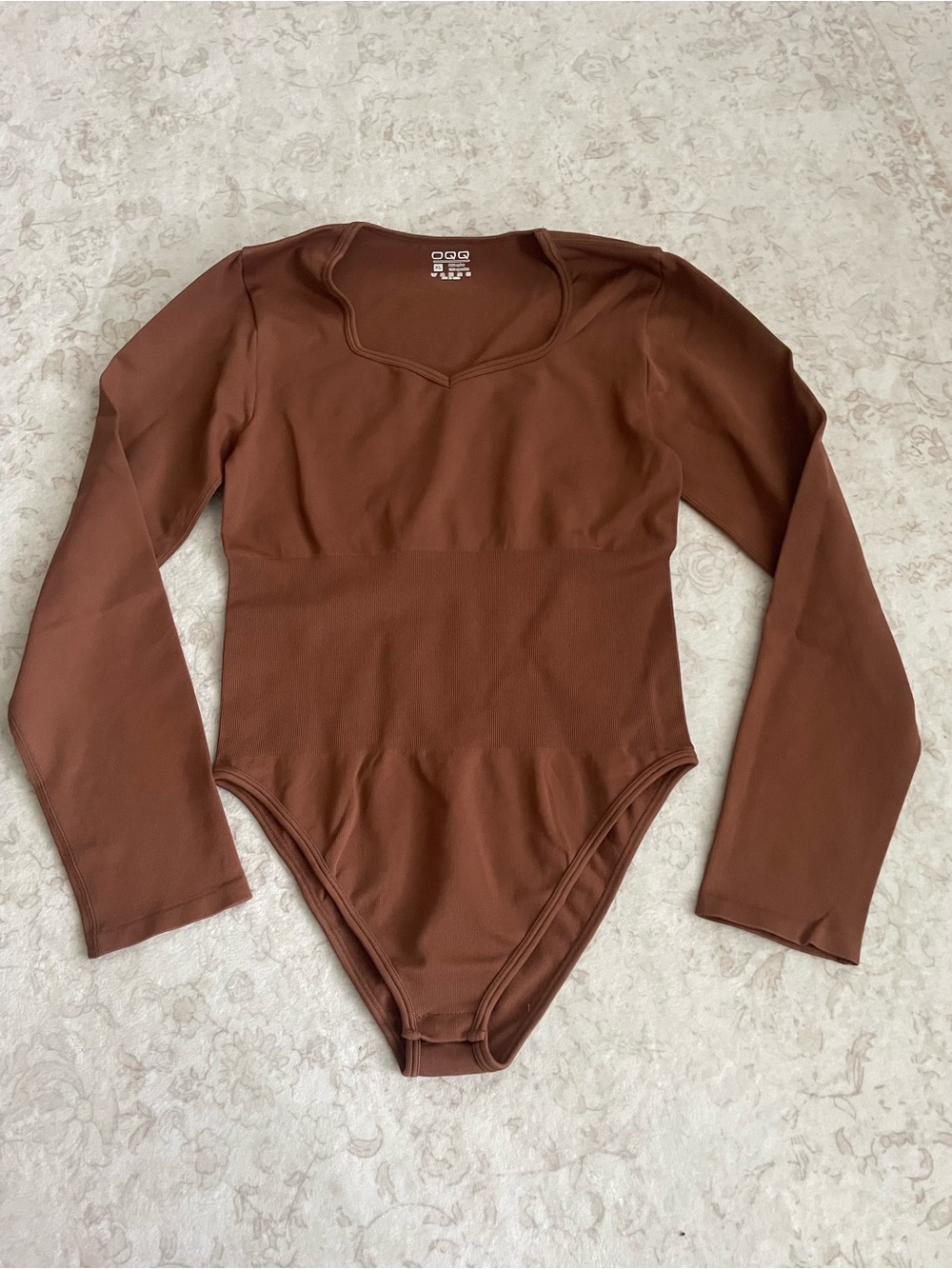 OQQ Long-Sleeve Bodysuit with tummy control